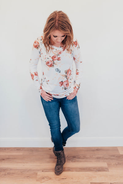 White floral criss cross shirt