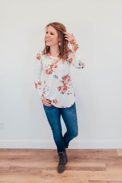 White floral criss cross shirt