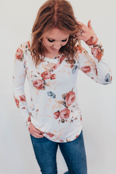 White floral criss cross shirt